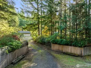 Gated entrance leads to property.