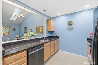 Kitchen, with granite countertops.