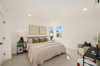 Spacious bedroom accommodates a king size bed.