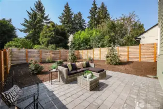 Large fenced yard with patio for relaxing or entertaining.