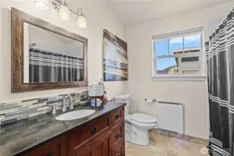 Primary en-suite with step in shower.