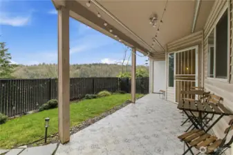 Rare fenced patio with private garden/green space.