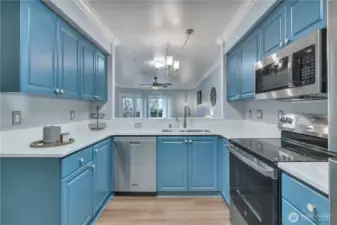 Quartz countertops paired with mother-of-pearl hardware