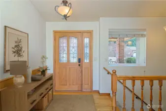 Level entry with straight views thru to the oversized living room picture windows.