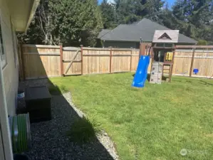 Back yard fencing installed in 2023 swing set stays!