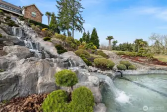 The mesmerizing waterfall feature captivates the senses, its gentle cascade delighting the eyes while soothing the soul. A true sanctuary of serenity, this tranquil oasis invites you to pause, breathe, and embrace the peaceful energy that surrounds you. You’ve just found your Zen!
