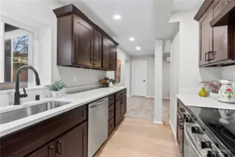 B/Lower Floor: Kitchen #2 w/Recessed Lighting. Door shown leads to Pantry/Hot Water Closet.