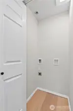 C/Lower Floor: Laundry Closet off Kitchen is setup for Stackable Unit. (not included)