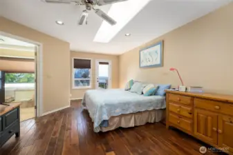 Primary suite with views and deck access
