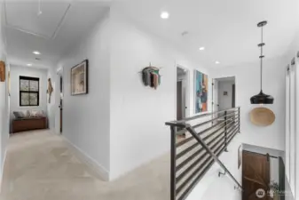 Upstairs hallways and stairwell w 10ft windows