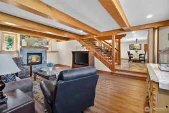 1st floor living room with timber beams and warm fireplace make it cozy on PNW nights!