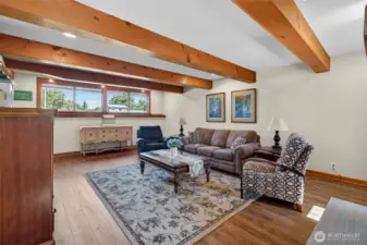 Reclaimed timber beams give this room the old world charm.