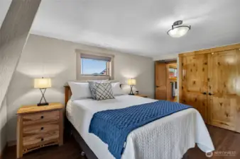 2nd story primary bedroom, with attached bathroom.  Cedar-lined closet.