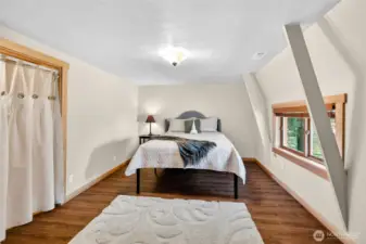2nd story bedroom #2 with cedar lined closet.