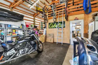 Storage for motorcycle, bikes, kayaks. Access to mini-shop within the shop.