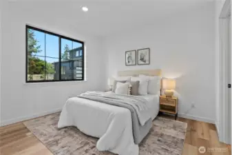 Large primary bedroom with ensuite bath & walk-in closet
