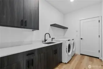 Laundry room complete with washer & dryer