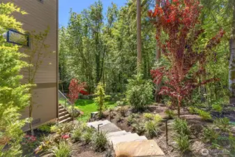 Gorgeous landscaping all around this spacious lot.