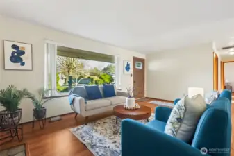 Here's a view near the fireplace. Alot more room for furniture, or artwork in your future home!