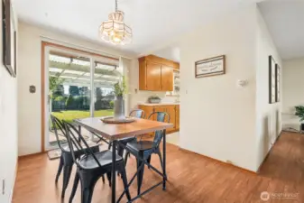 Looking from the hall you can see the entry to the kitchen.