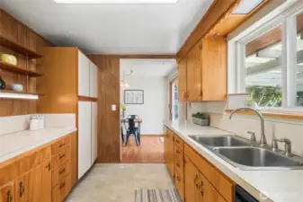 One more look at the double basin sink and cupboards galore!