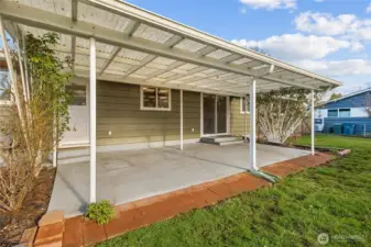 Check out this amazing covered patio. You can have a ton of furniture out here along with a BBQ for the upcoming summer.