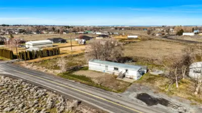 Value is in the 2.27 acres of land. SINGLE WIDE IS BOARDED UP and no access is available without Seller permission. Call helpful Listing Agent for access with Seller accompaniment.