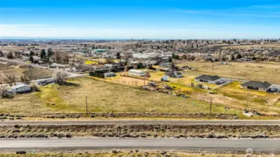 Looking at the property from the other side of the RR tracks which are at the front of the picture.