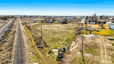 A great view of the tip of the property as it abuts the old RR tracks. An old little structure is near the property stake.