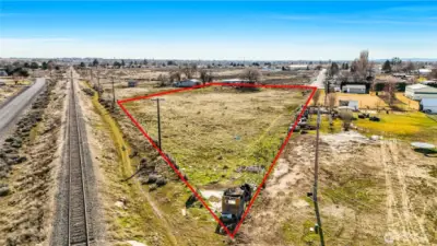 The property is a rectangle with a triangular shape on this end closest to you.  2.27 acres.