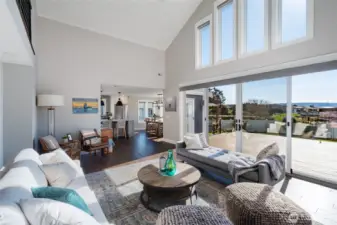 Living room looking toward kitchen and dining area