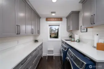 Utility room with sink and loads of storage