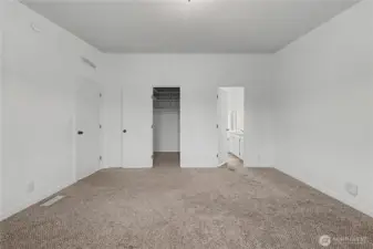 Primary Bedroom to the right