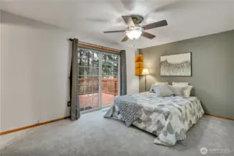 The primary suite has access to the enormous deck....