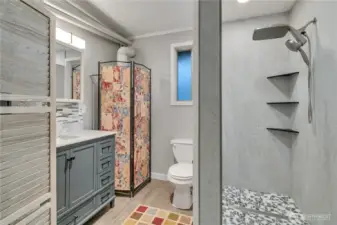 Check out the additional 3/4 bath with the custom shower pan....