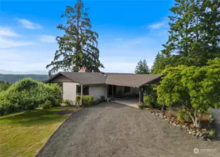 This property has amazing Olympic Mountain, Henderson Bay, and territorial views and is nestled on 1.47 acres.  It includes a 3000+ sq. ft. home and a 150+ year old barn, mature landscaping, yet near downtown Gig Harbor, shopping, and freeway access.