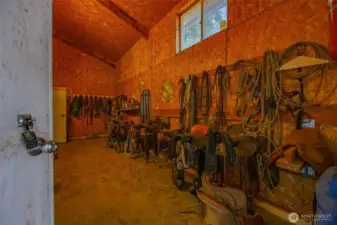 Conveniently attached to the indoor riding arena, the 10' x 20' tack room offers ample space to store all your gear and equipment in one organized, easy-to-access location.
