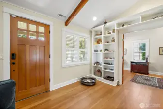 As you enter the home you are immediately greeted by a handsome solid wood front door and rich 5" golden fir floors sure to impress your guests.