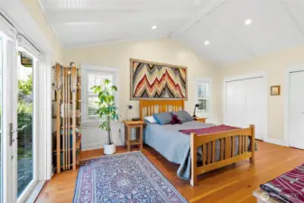 The primary bedroom is your personal retreat featuring vaulted ceilings, and a light color pallet perfect for any decor.