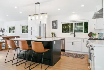 No limitation on larger gatherings in this wonderful kitchen with eat in seating at bar and table for a crowd.