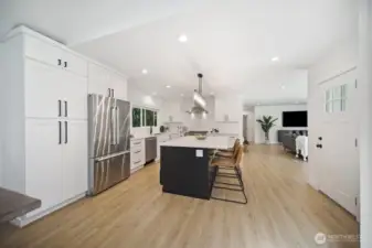 Plenty of room in this open concept kitchen, dining and living room.