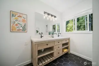 Main bath convenient to both bedroom 2 & 3. You love the chosen hard surfaces.