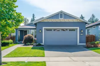 Charming street appeal welcomes you to this meticulously maintained popular "Monaco" home a short walk to the Lodge!