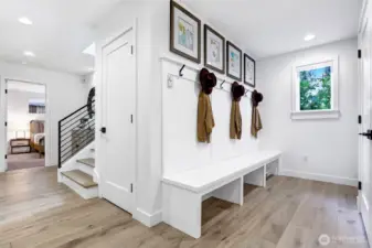 Mud room just off the entrance from the garage offers the perfect spot for your jackets, backpacks and shoes! It also has  the perfect spot for a second refrigerator!