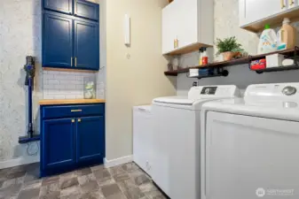 Laundry with built-in cabinets for extra storage