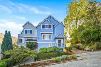 Two-townhouse complex with alley on a quiet tree-lined street
