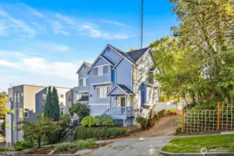 Two-townhouse complex with alley on a quiet tree-lined street
