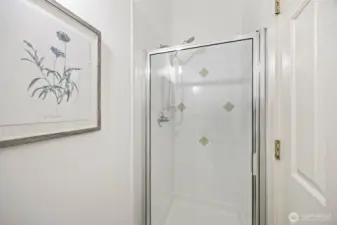 Top level bedroom with attached bathroom including WC/shower room