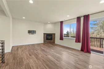 Good sized open area with a deck to the outside