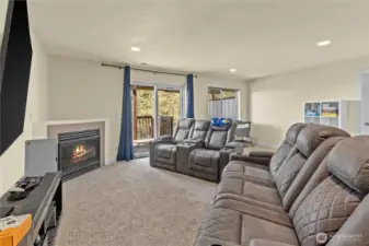 Huge lower level family room with fireplace